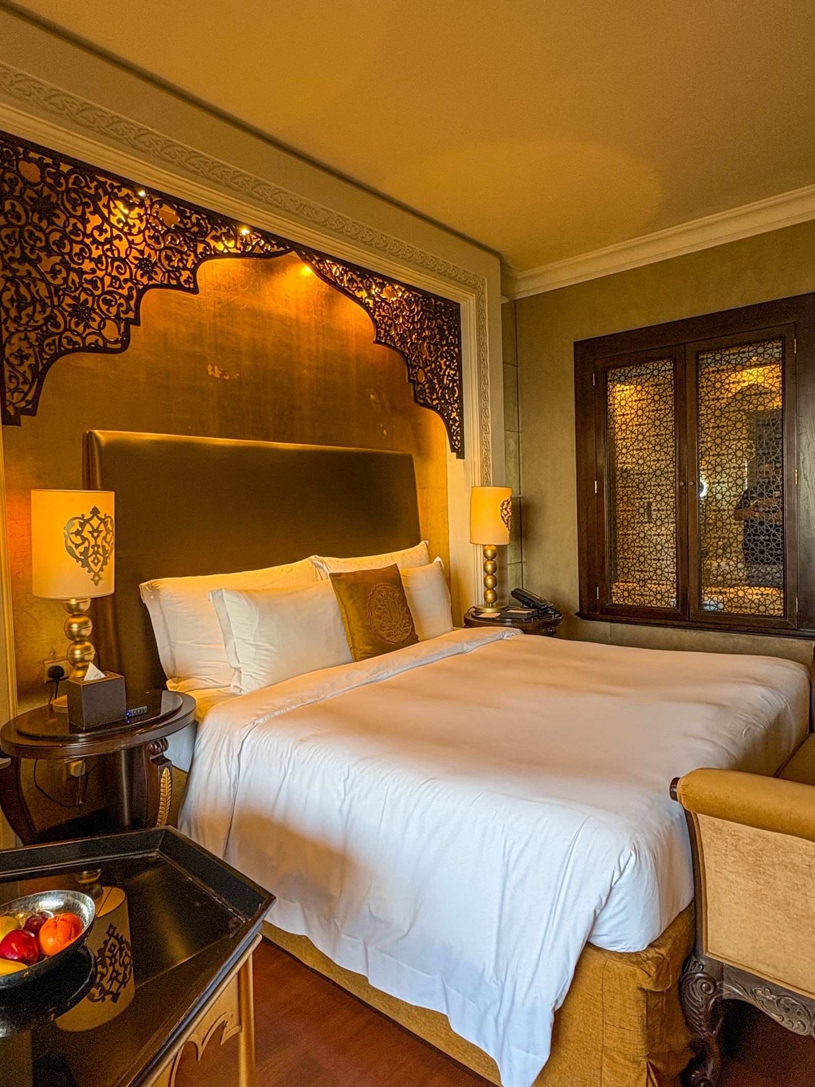 Boutique hotel suite in warm wood tones